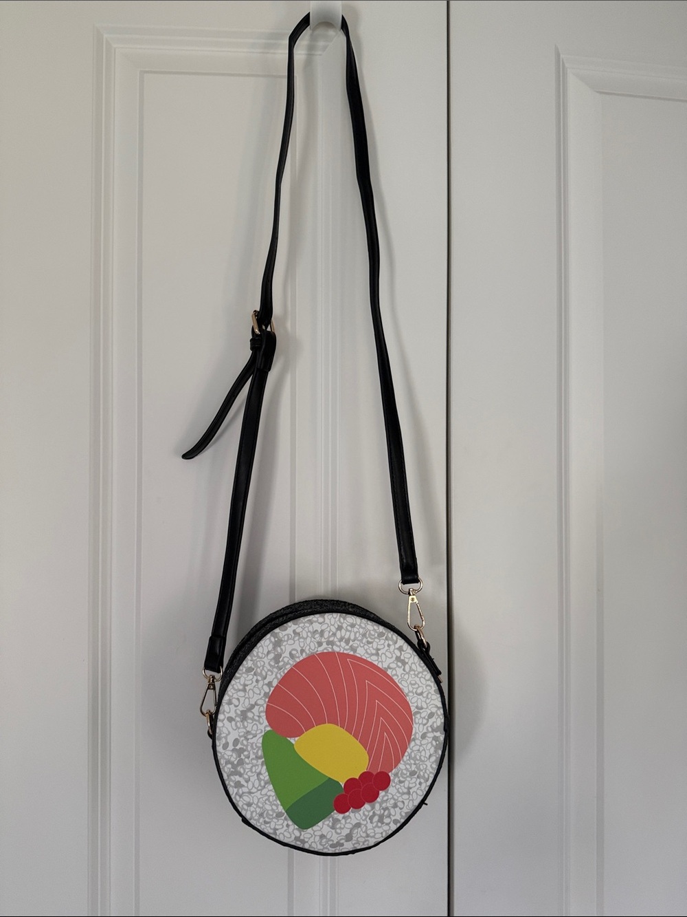 Round Crossbody Bag with Pink and Multicolor Accent